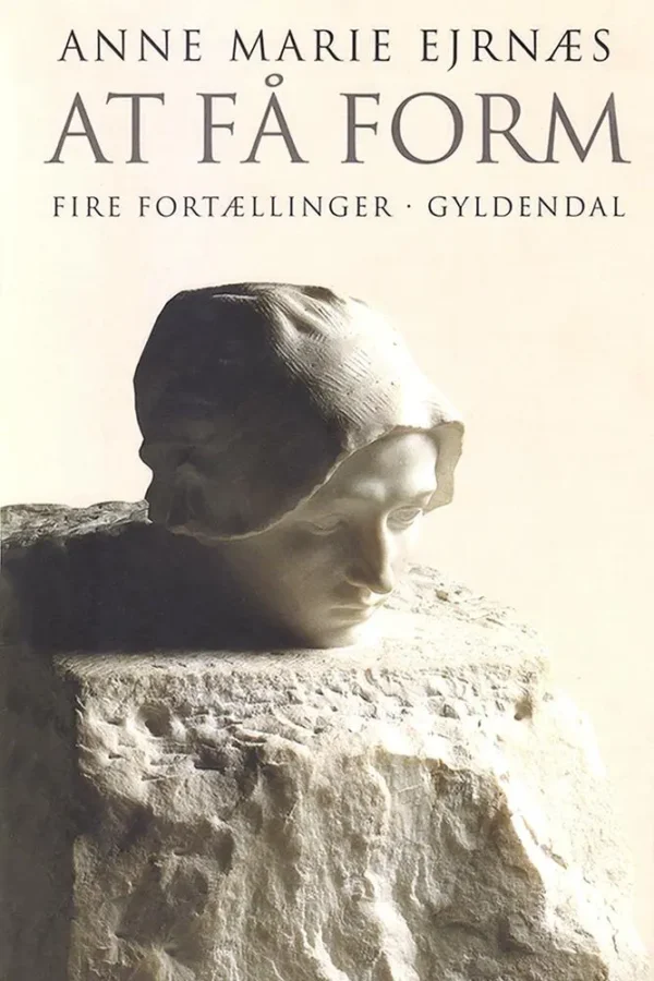 At få form
