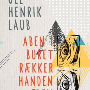 Aben i buret rækker hånden frem